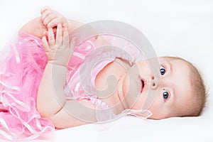 Baby girl wearing a pink dress