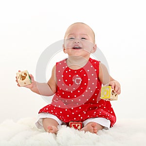 Baby Girl on White Blanket with Stork Bite on Upper Lip