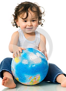 Baby with globe puzzle.