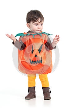 Baby with a halloween pumpkin disguise photo