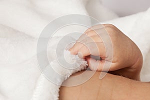 Baby hand closeup photo