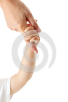 Baby hand holding mother finger