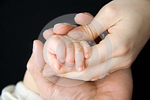 Baby Hand with mother and father