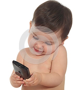 Baby happy and concentrated in a mobile phone