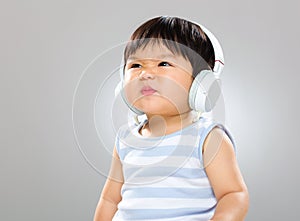 Baby with headphone