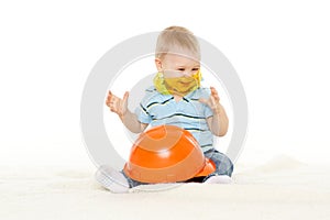Baby with helmet and protective glasses.