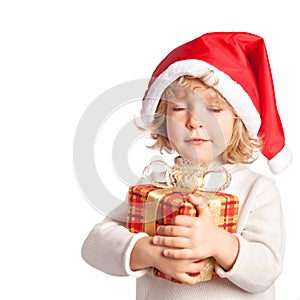 Baby holding Christmas gift