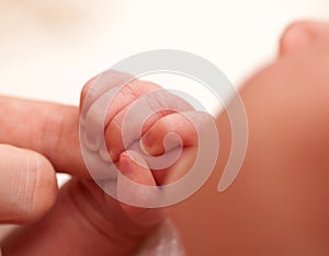 Baby Holding Finger