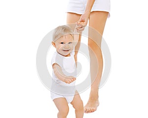 Baby holding hand of mother having fun together