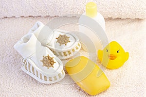 baby hygiene and bath items, shampoo bottle, baby soap, towel