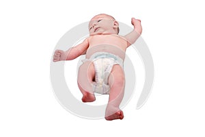 Baby infant boy lies in a diaper on the changing table, isolated on a whi