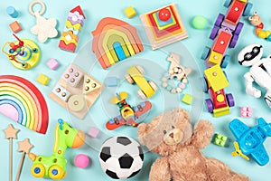 Baby kids toys pattern. Set of colorful educational wooden and fluffy toys for children on light blue background. Top