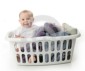 Baby in a laundry basket