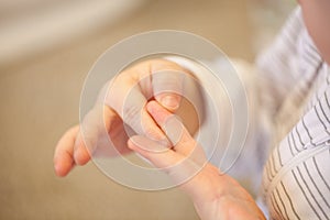 Baby learning to count on the fingers