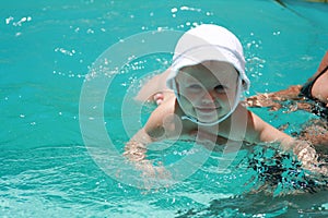 Baby learning to swim