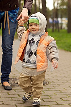 Baby Learning to Walk in Park