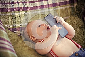 Baby learns technology. New technology, modern life