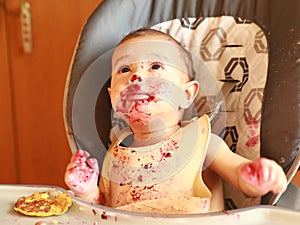 Baby led weaning - Curious baby eating blueberries