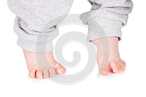 Baby legs on a white background.