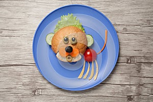 Baby lion created of bread and vegetables