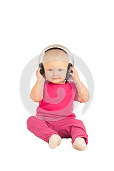 Baby listening the music in headphones