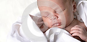 Baby looking with big eyes just after having a good sleep with people stock photo