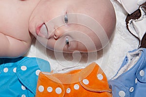 Baby Looking at Cloth Diapers