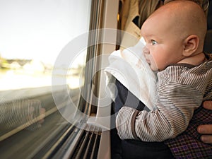 Baby Looking out Train Window