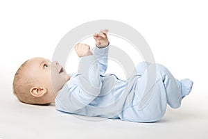 Baby Lying on Back, Happy Infant Kid Dressed in Blue Bodysuit