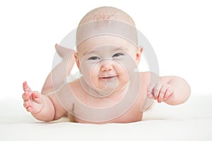 Baby lying smilingly photo