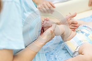 Baby massage, close up shot. Child massage, newborn.