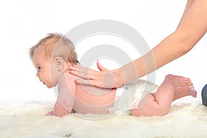 Baby massage. Spine