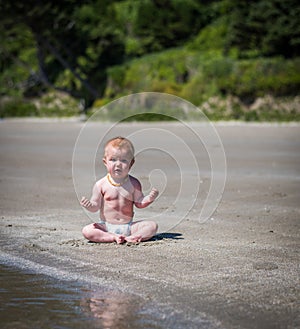 Baby meditation at the beach