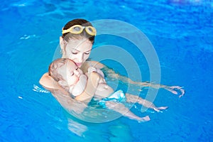 Baby and moher at swimming lesson