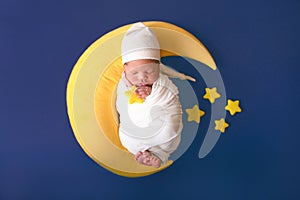 Baby in the moon, toys, newborn baby in a costume, little boy, childrens