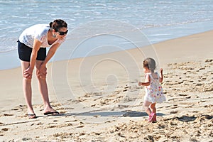 Baby Mother on Beach