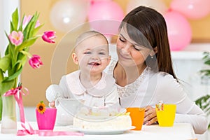 Baby and mother celebrate first birthday