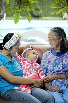 Baby, mother and grandma