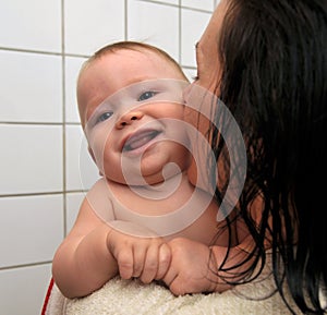 Baby and mother in shower room