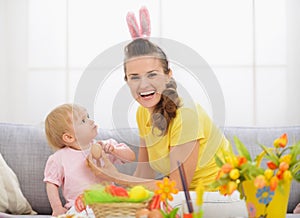 Baby and mother spending time together on Easter