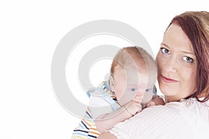 Baby on mothers shoulder