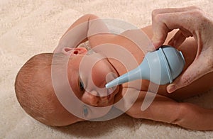 Baby and nasal aspirator photo