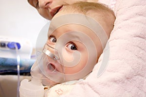 Baby with nebulizer mask