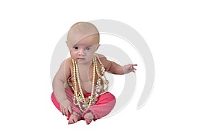 Baby with necklaces