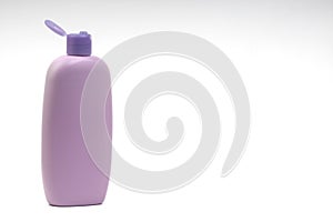 Baby oil or shampoo bottle isolated on white background