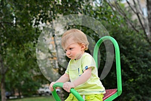 Baby one year old walks with pacifier