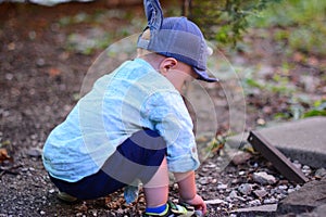 Baby one year old walks with pacifier