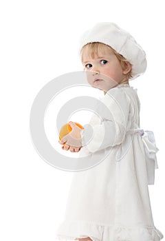 Baby with orange isolated on white