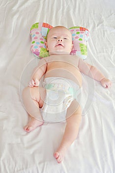 Baby   on  orthopedic pillow photo