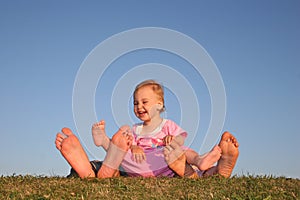 Baby and parent's legs